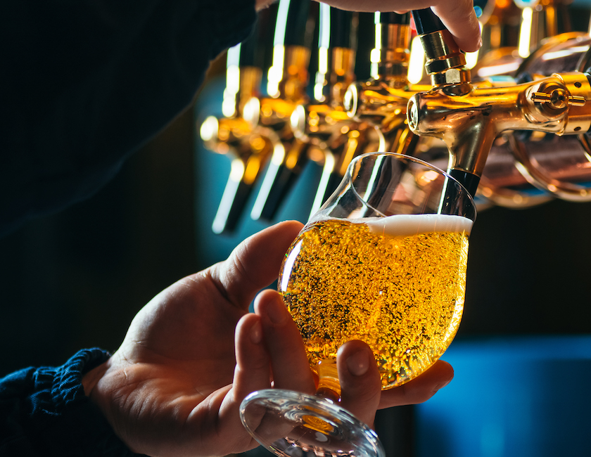 pouring a craft beer from tap